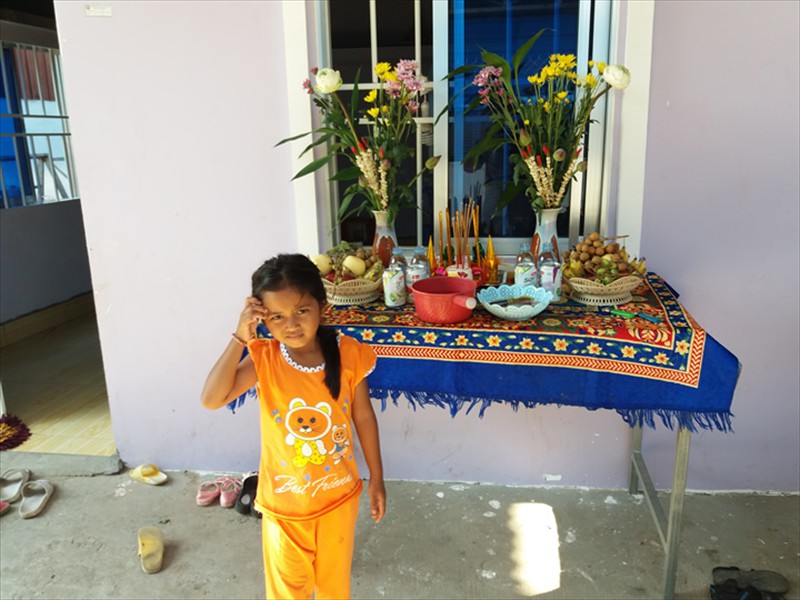 One of his daughters at his home